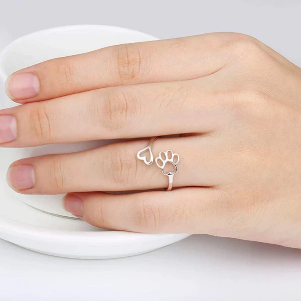 Ambachtelijke ring met poot en hart
